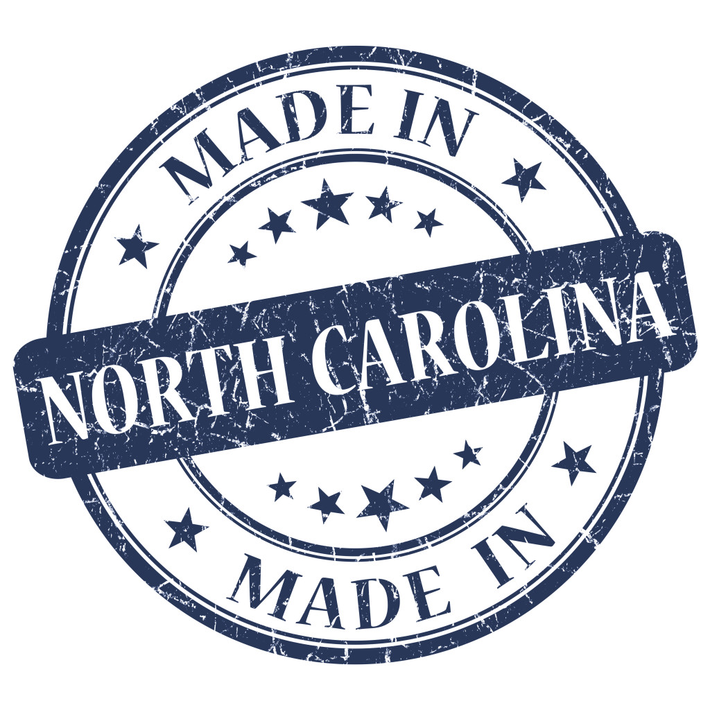 made in North Carolina blue round grunge isolated stamp